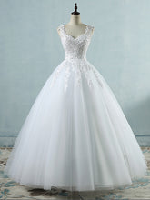 Ball Gowns Spaghetti Straps Tulle Wedding Dresses Pearls Bridal Dress WD315